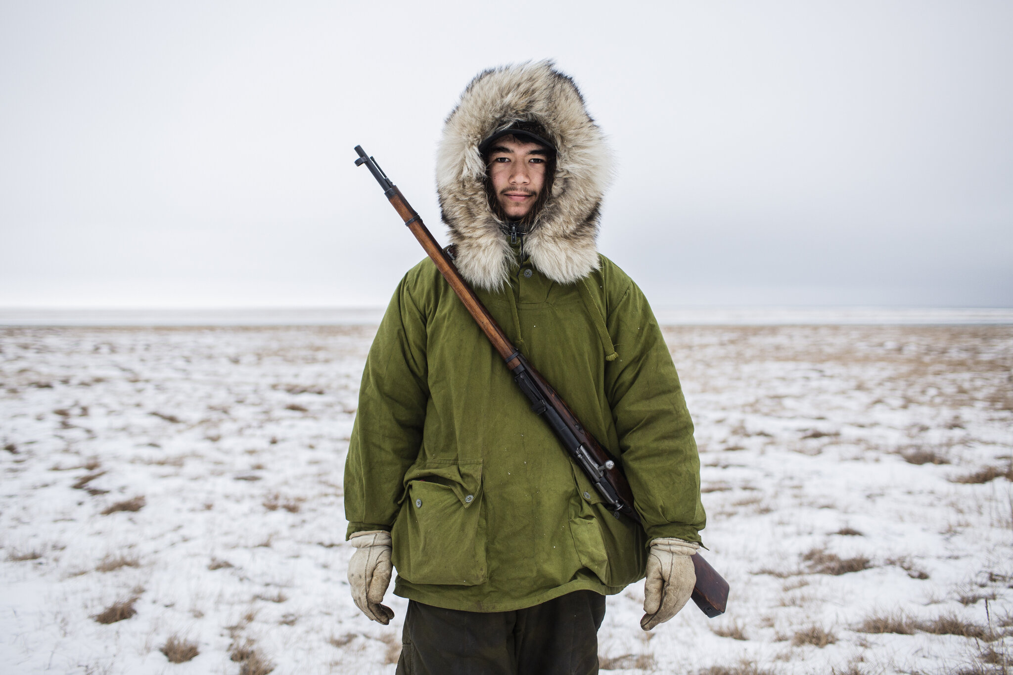  Vebjørn Aishana Reitan prepares to hunt caribou in Kaktovik, Alaska, an Iñupiat village on the coast of the Beaufort Sea located within the Arctic Wildlife Refuge. October 18th, 2015. The Refuge is currently in danger of being opened up to gas and o