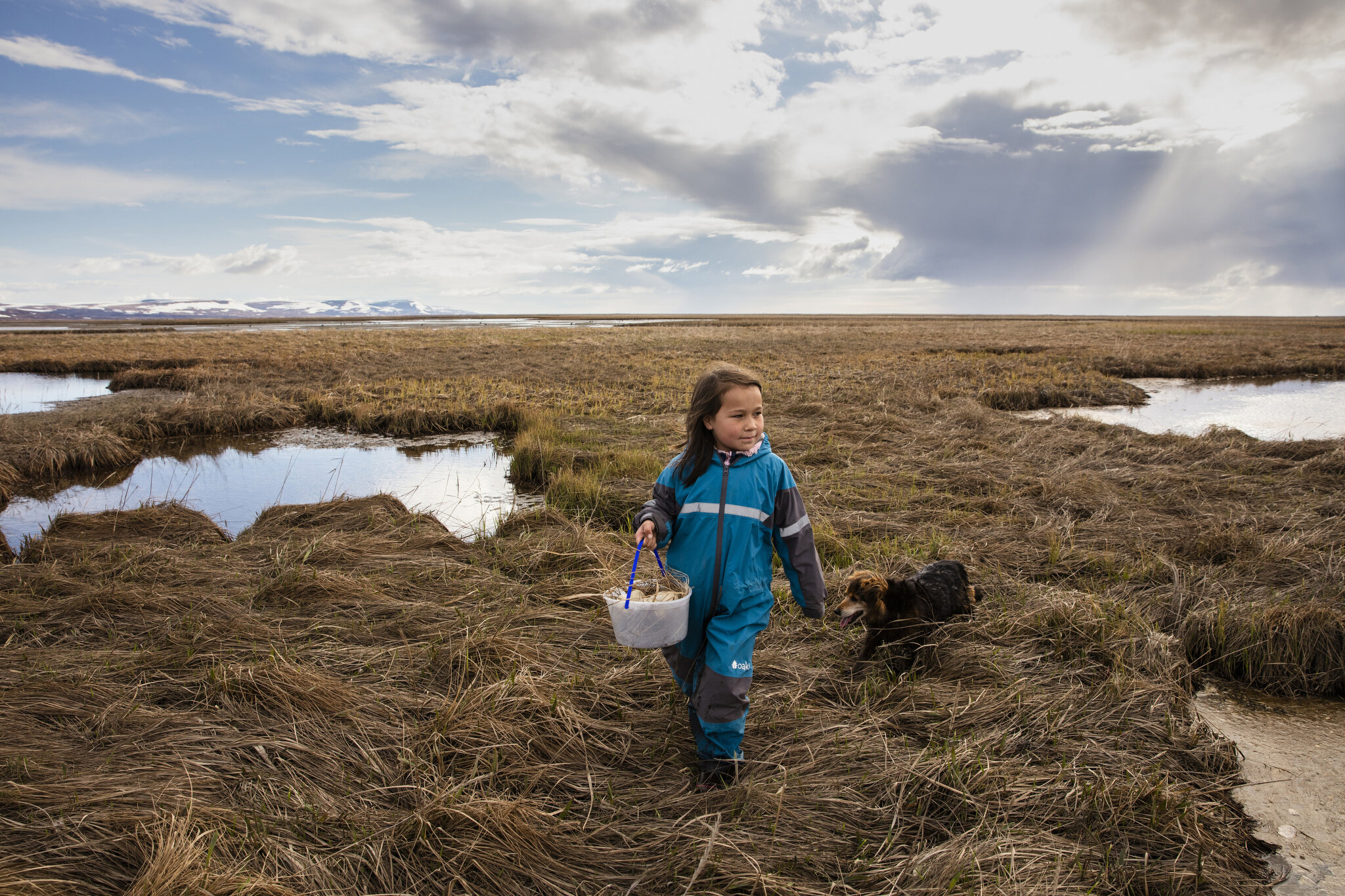  Kaleigh Charles collects goose eggs with her family along the Ninglick River in western Alaska. The Charles family live nearby in Newtok, a Yupik village of roughly 380 people. May 26th, 2019. Subsistence-based practices such as gathering eggs, hunt