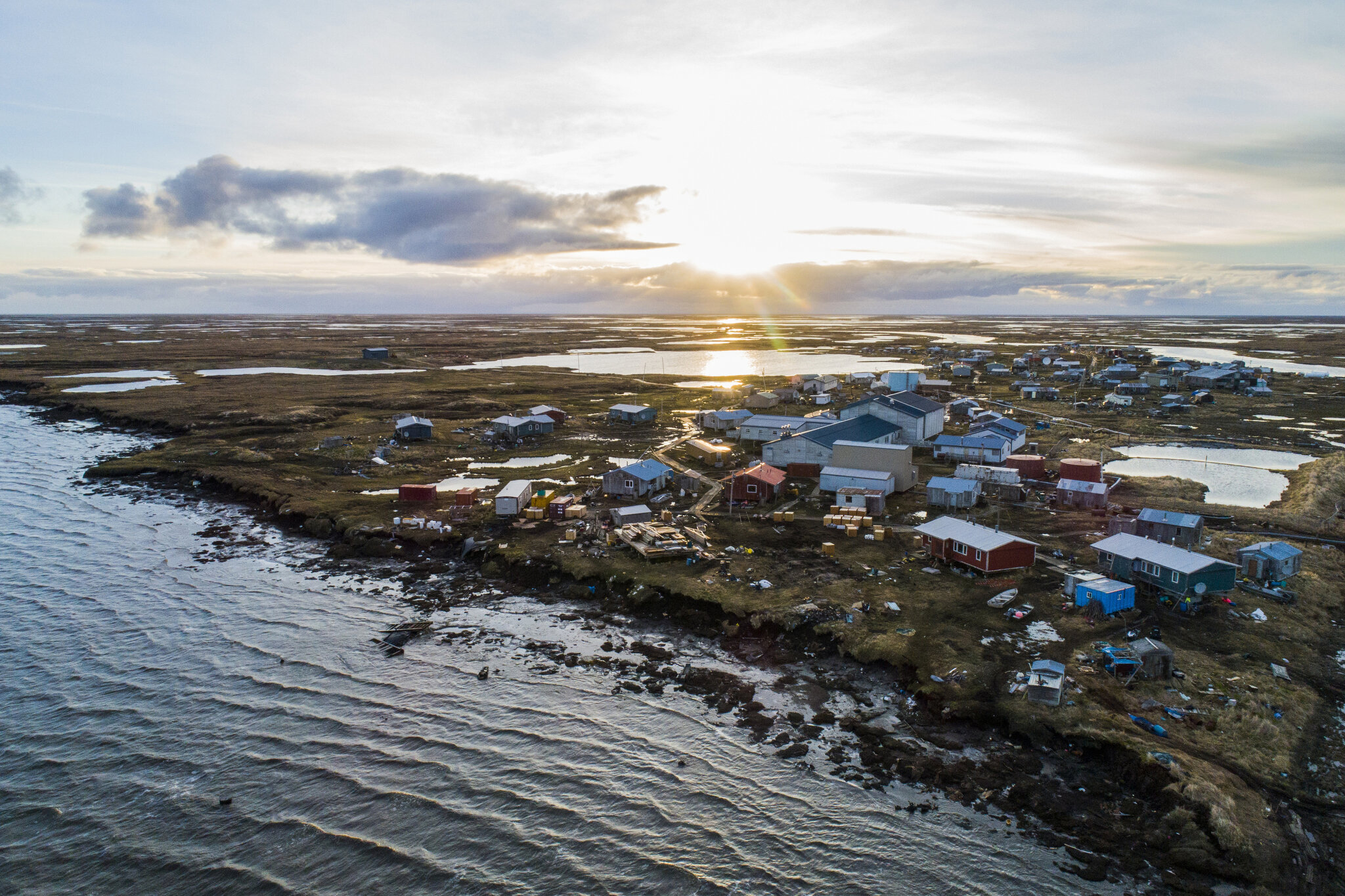  The Yupik village of Newtok in western Alaska, population 380, flanked by the Ninglik and Newtok Rivers. May 25th, 2019. The village is sinking as the permafrost beneath it thaws. Erosion has already wiped out nearly a mile of NewtokÕs land, and it 