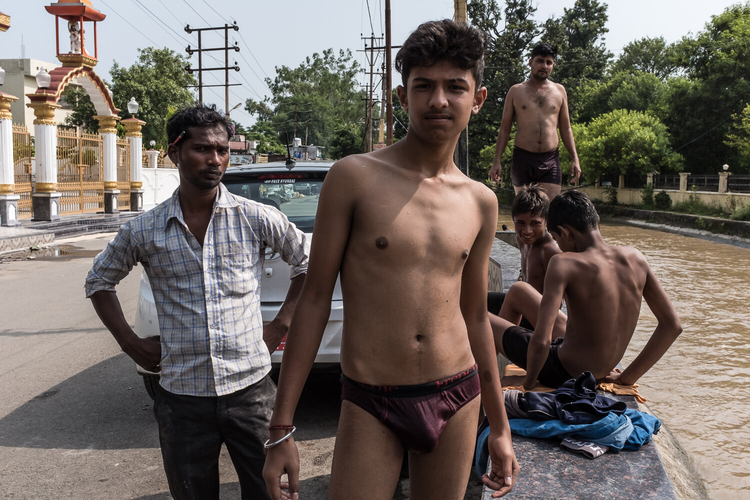  Boys cool off in the cold water of a canal fed by the Chenab River on Thursday, August 10, 2017 in Jammu, Jammu & Kashmir, India. The Chenab is one of the tributaries of the Indus River, originating the glaciers of the Himalayas. 