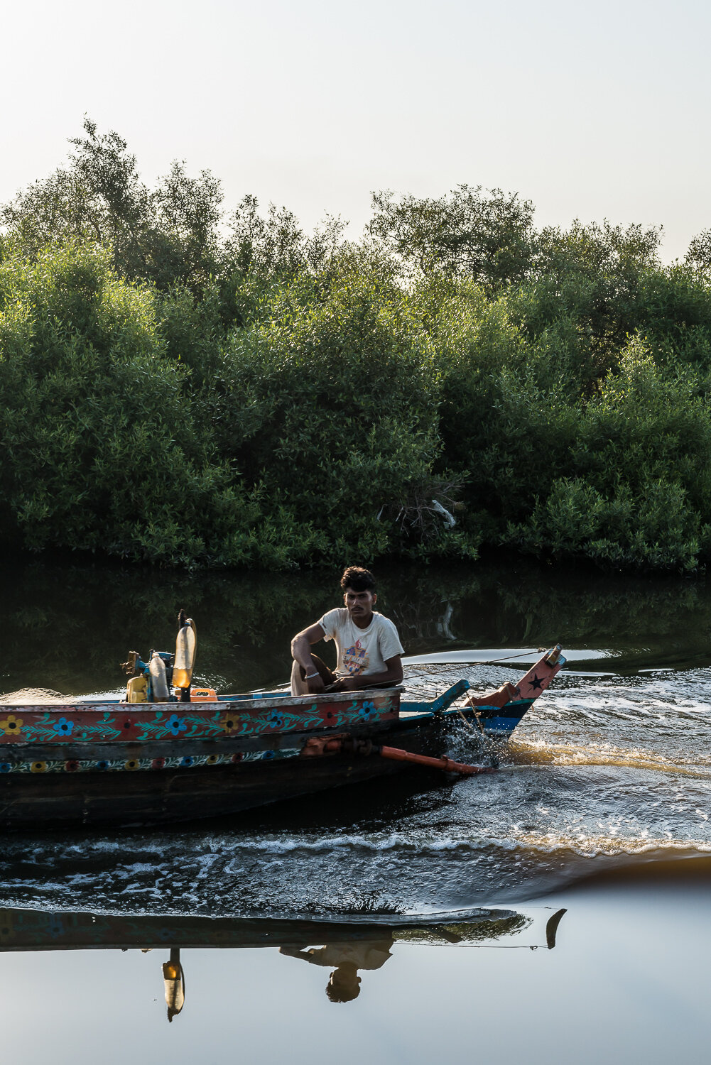  A fisherman in the mangroves of the Indus River delta on Tuesday, October 8, 2019 in Rehri Goth, Sindh, Pakistan. 