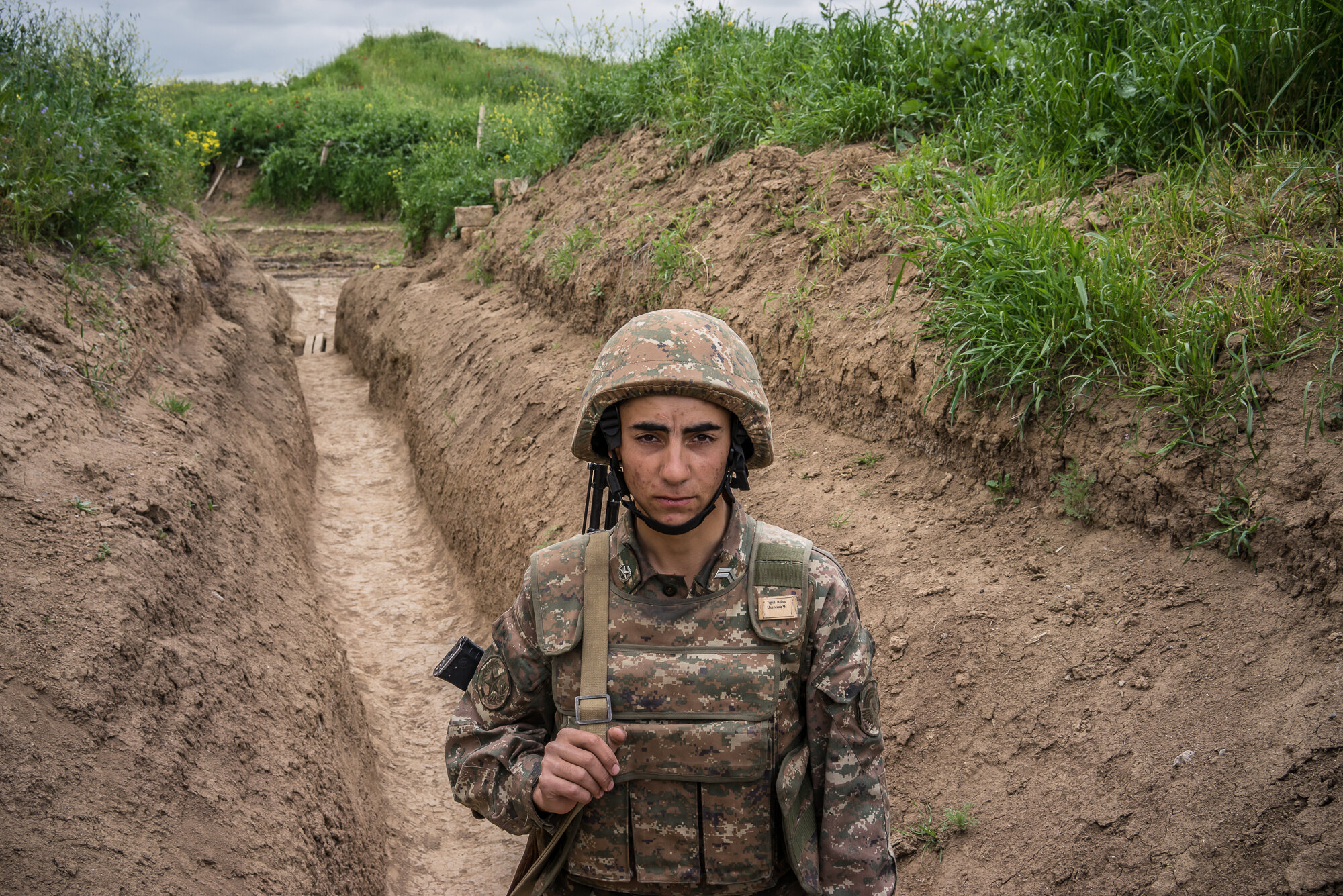  A member of the armed forces of Nagorno-Karabakh at a post along the line of contact with Azerbaijani forces in the eastern direction. Near Agdam, Nagorno-Karabakh. 2015. 
