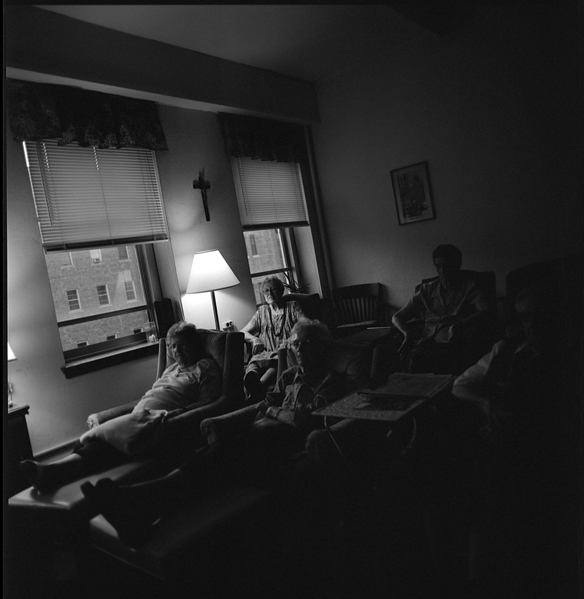  The younger Sisters relax at the end of the day watching television in the lounge. 