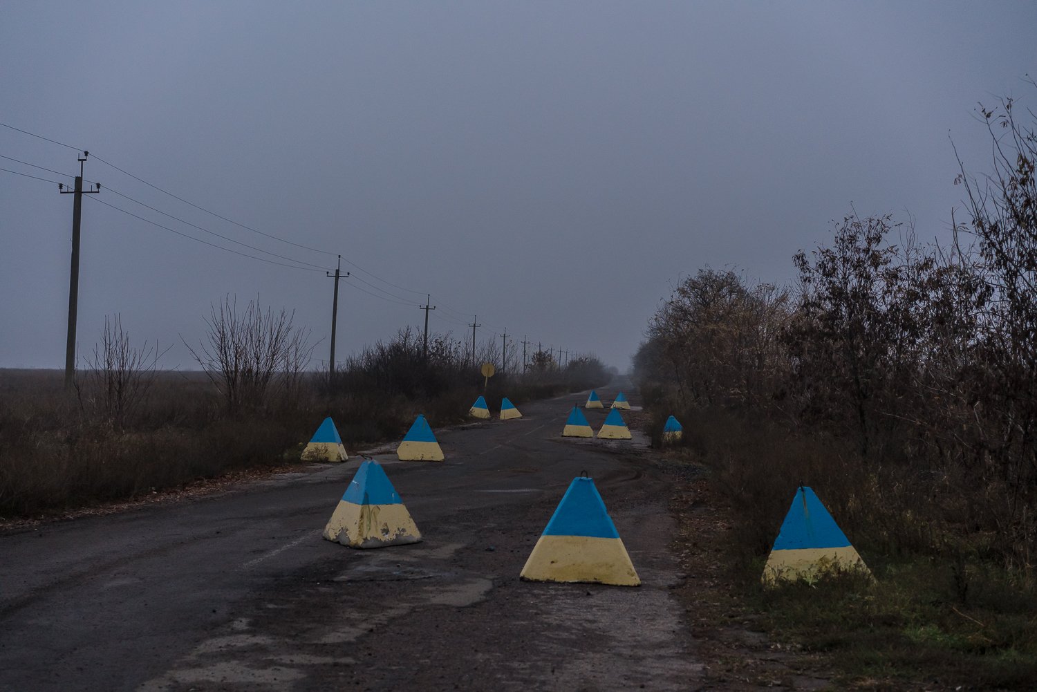 Concrete barriers near a Ukrainian military checkpoint on Thursday, November 4, 2021 outside Hranitne, Ukraine. 