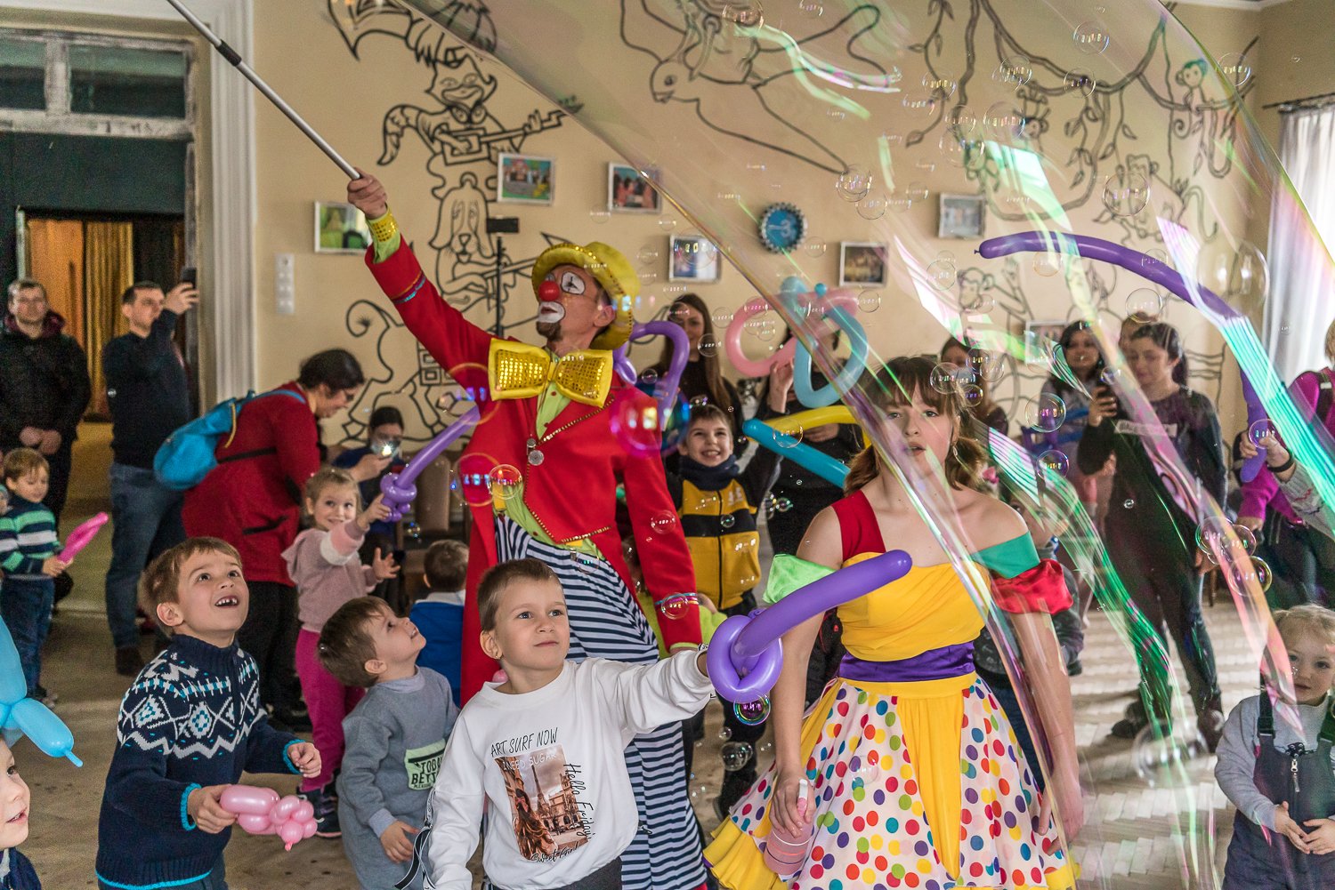  Yevheniy, who did not want to provide his last name, performing as Bantik the Clown, puts on a show for children at the Mariupol Puppet Theater on Sunday, January 30, 2022 in Mariupol, Ukraine. 