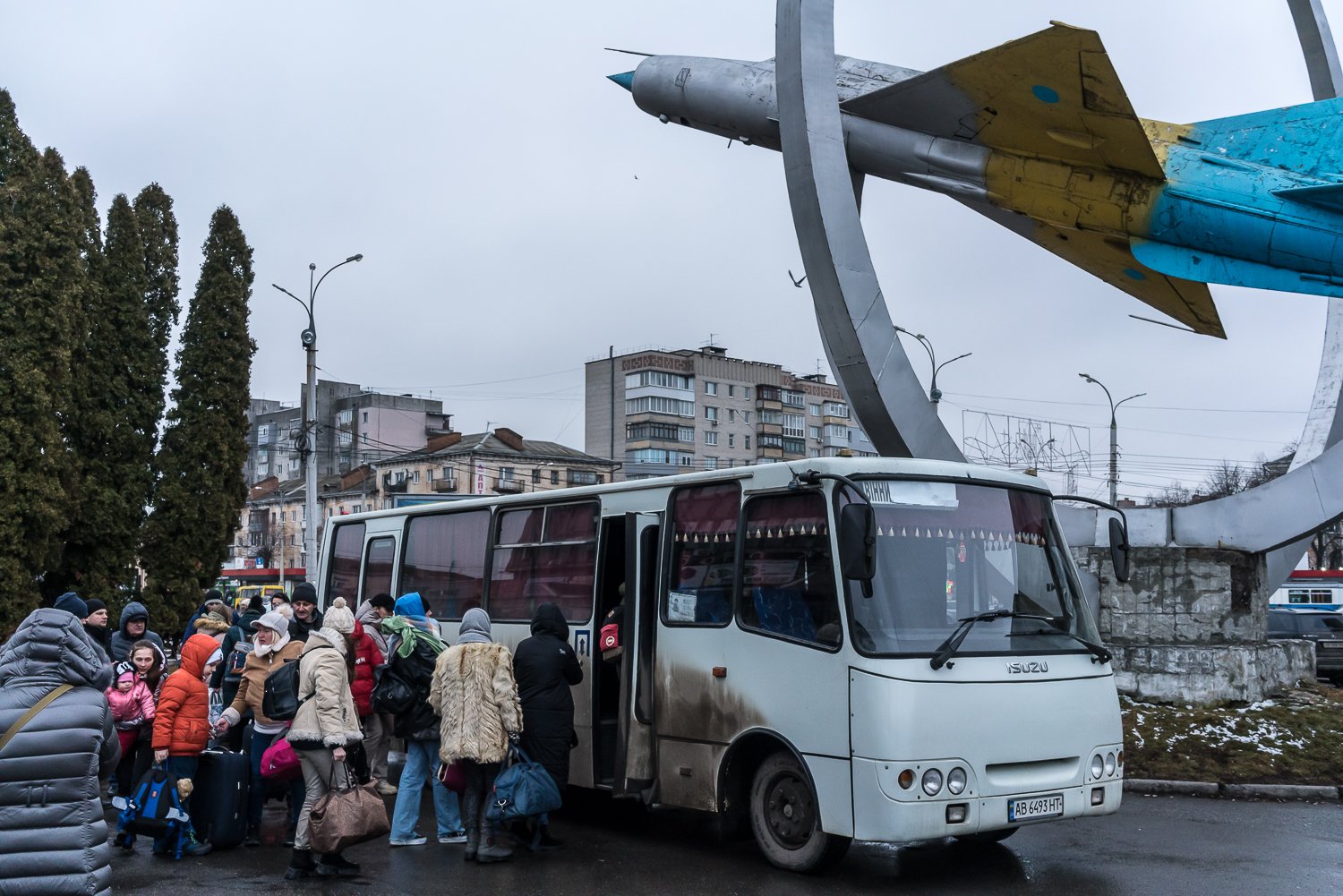  People board a bus arranged by volunteers to evacuate them from Ukraine to Moldova on Wednesday, March 2, 2022 in Vinnytsia, Ukraine. 