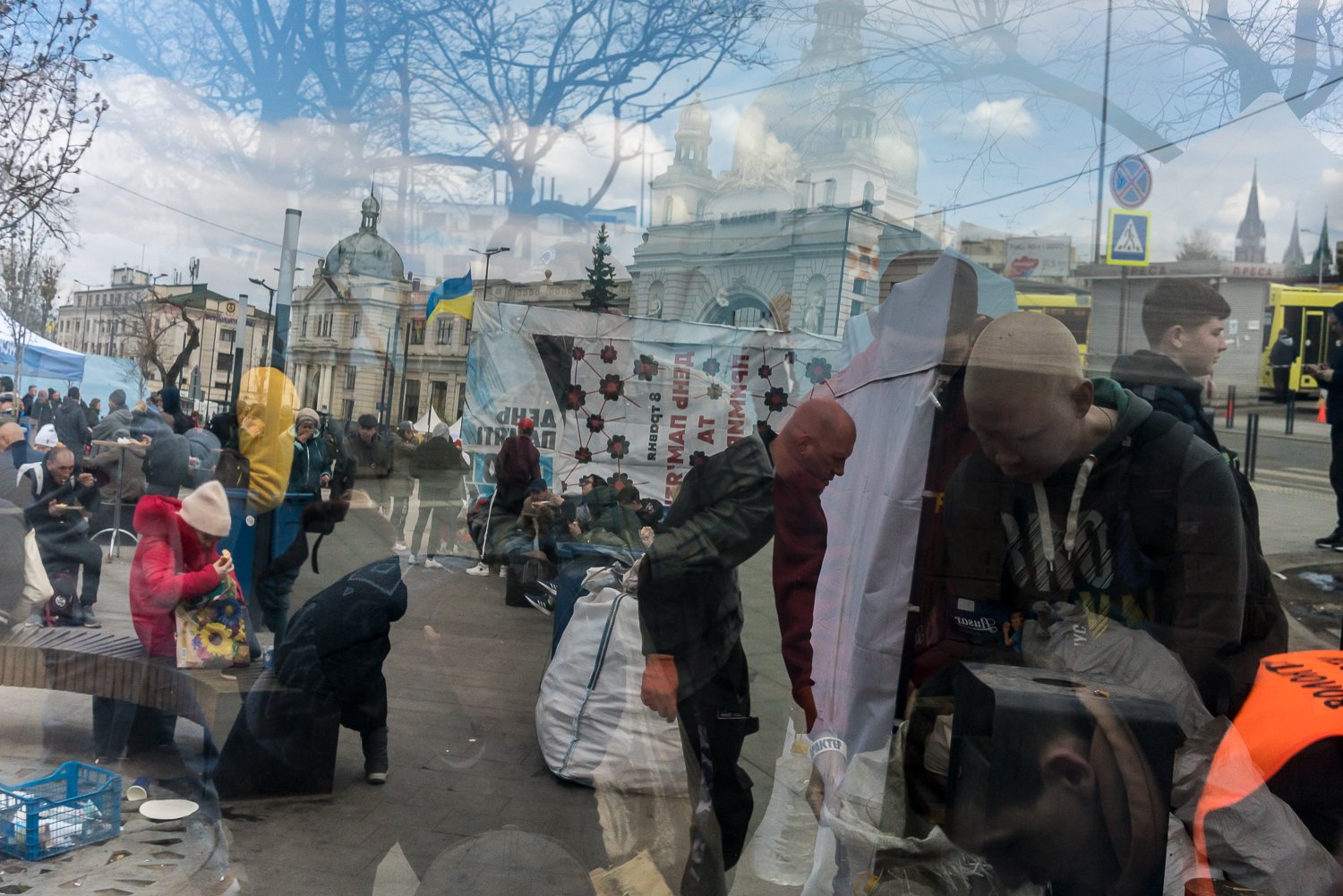  Volunteers unload fire wood from a van at the main train station on Tuesday, April 12, 2022 in Lviv, Ukraine. 