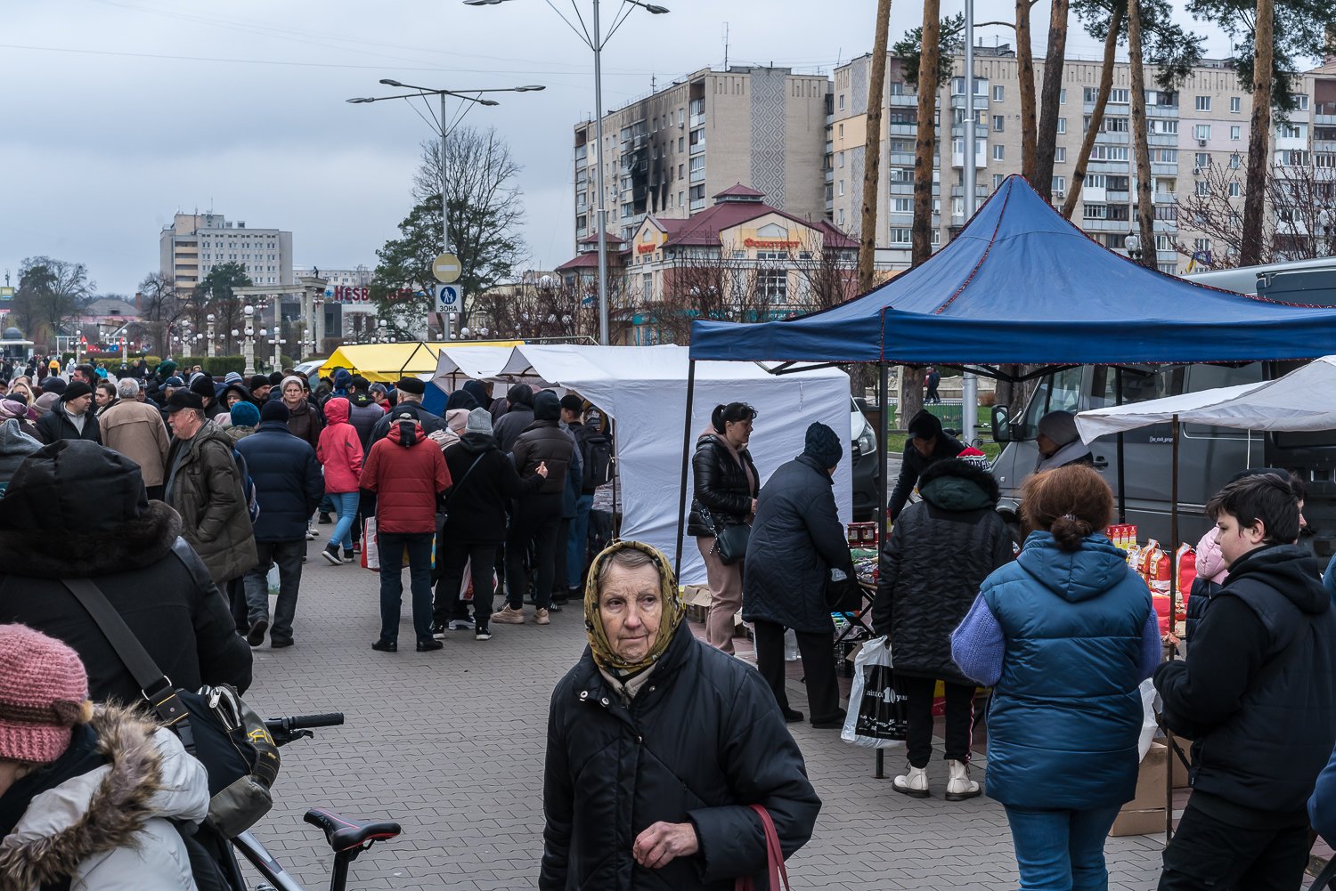  Shoppers at a street market in the city center on Thursday, April 21, 2022 in Irpin, Ukraine. 