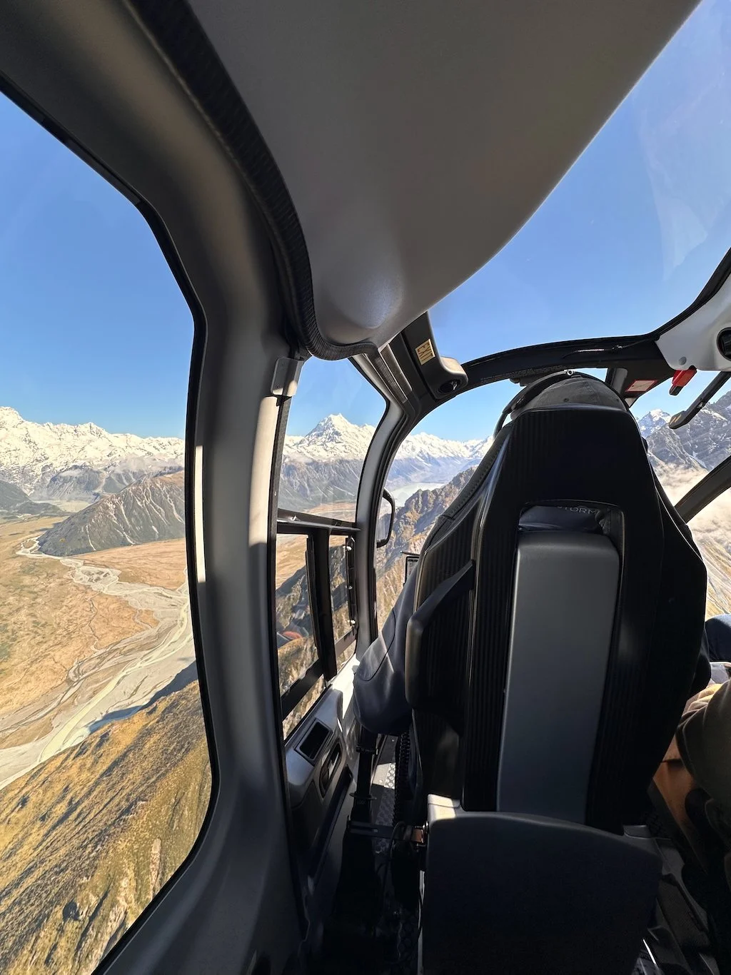 Aoraki/Mt Cook as seen from behind a helicopter pilot