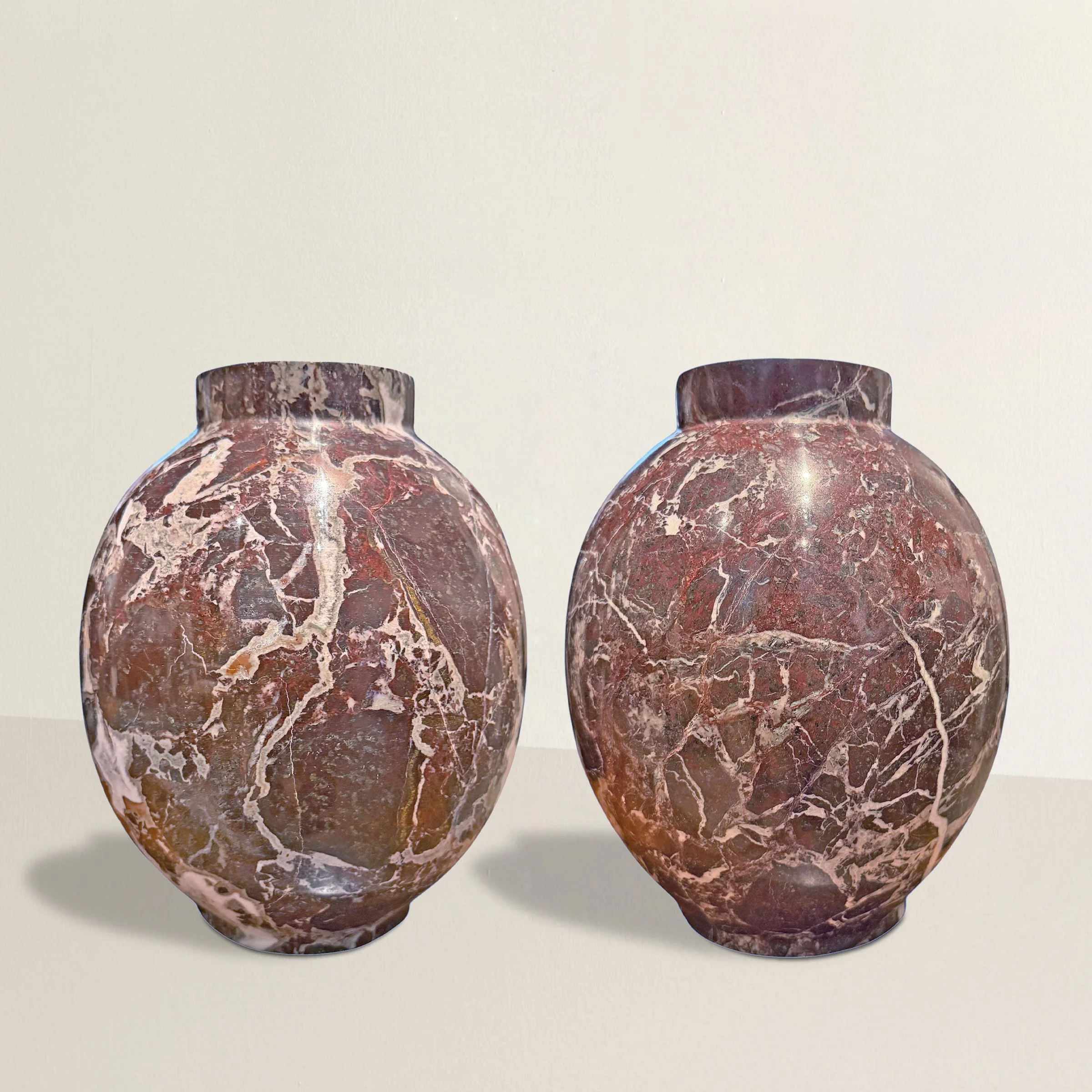 Pair of Red Marble Vases