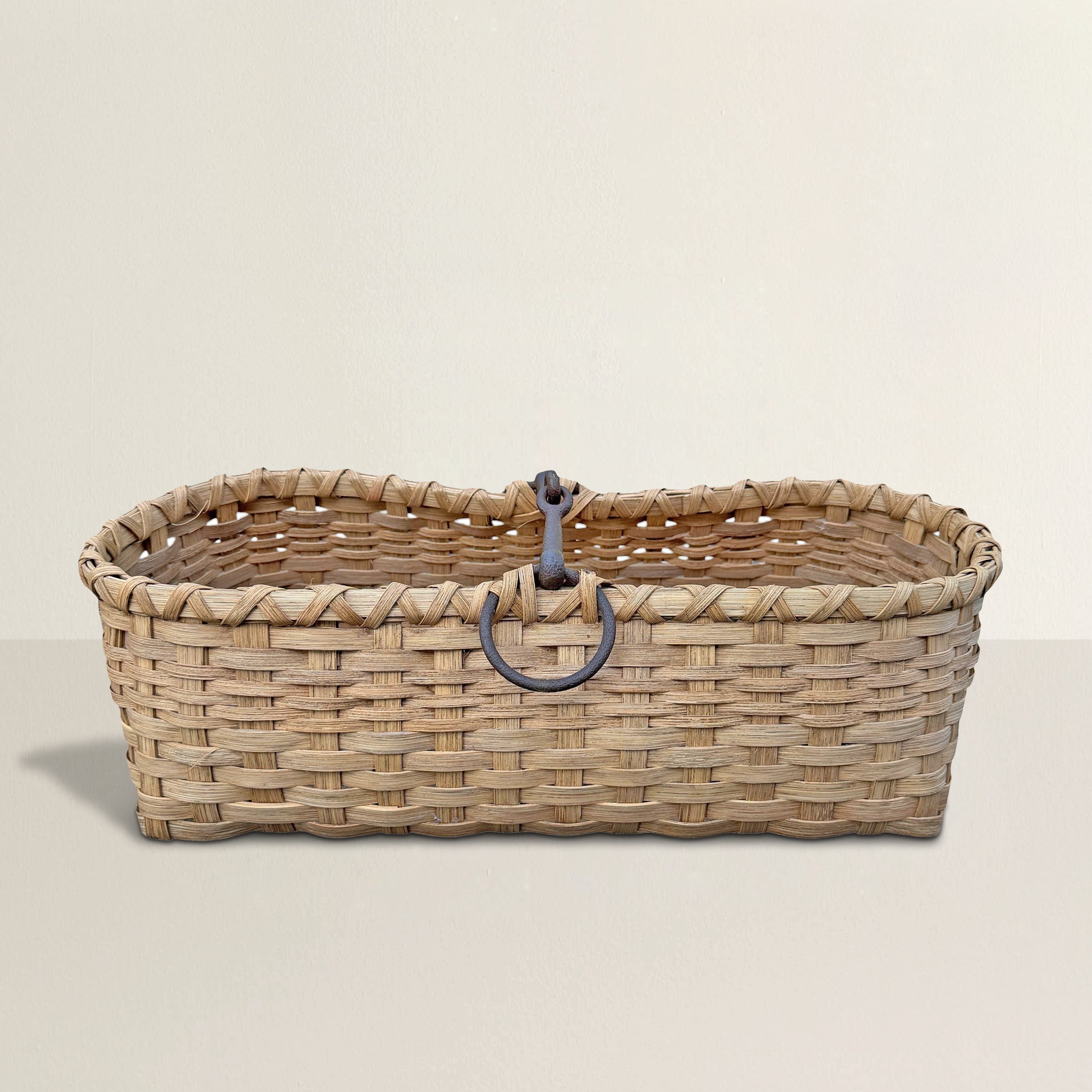 Hand Woven Basket with Horse Bit Handle.jpg