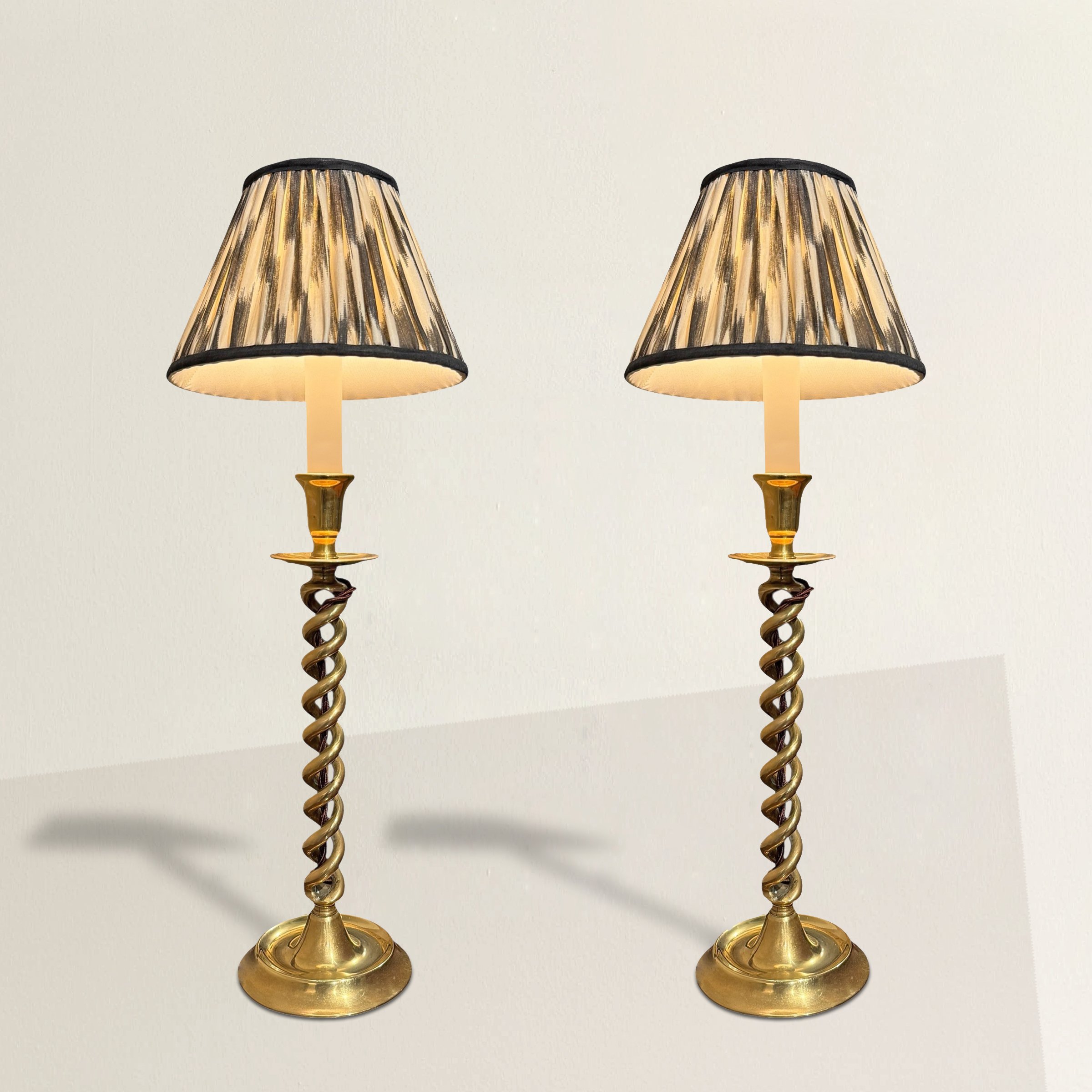 Pair of Brass Twist Candlestick Lamps.jpg