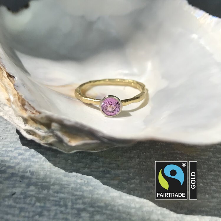 Pink sapphire solitaire in fairtrade gold