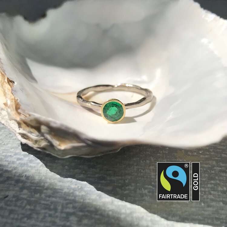 emerald solitaire ring in Faritrade gold
