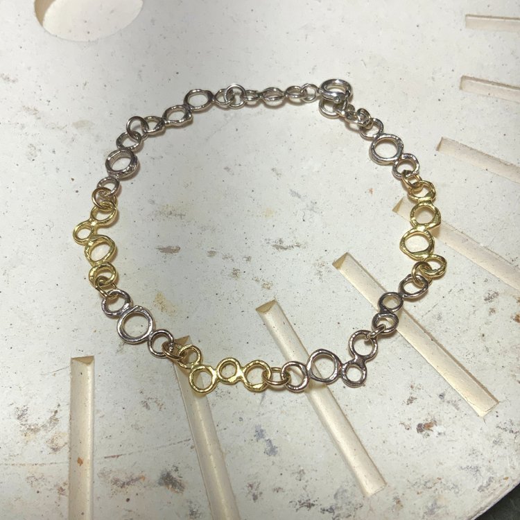 white and yellow gold bubble bracelet