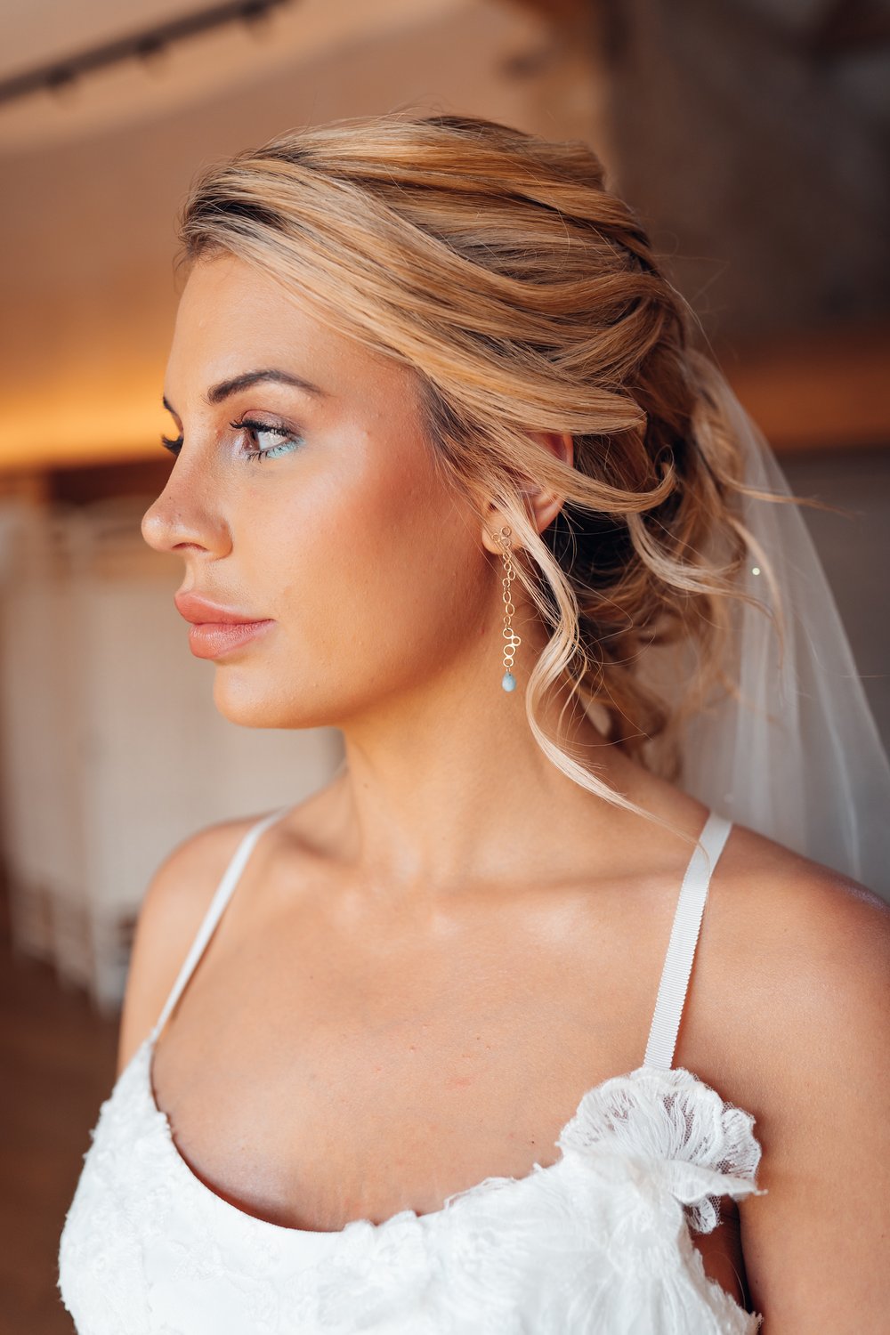 Blue bridal eye makeup and aquamarine earrings by Erin Cox Jewellery