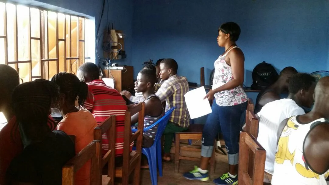 TVL's female instructor, Anita teaching the high school senior class in Golu.