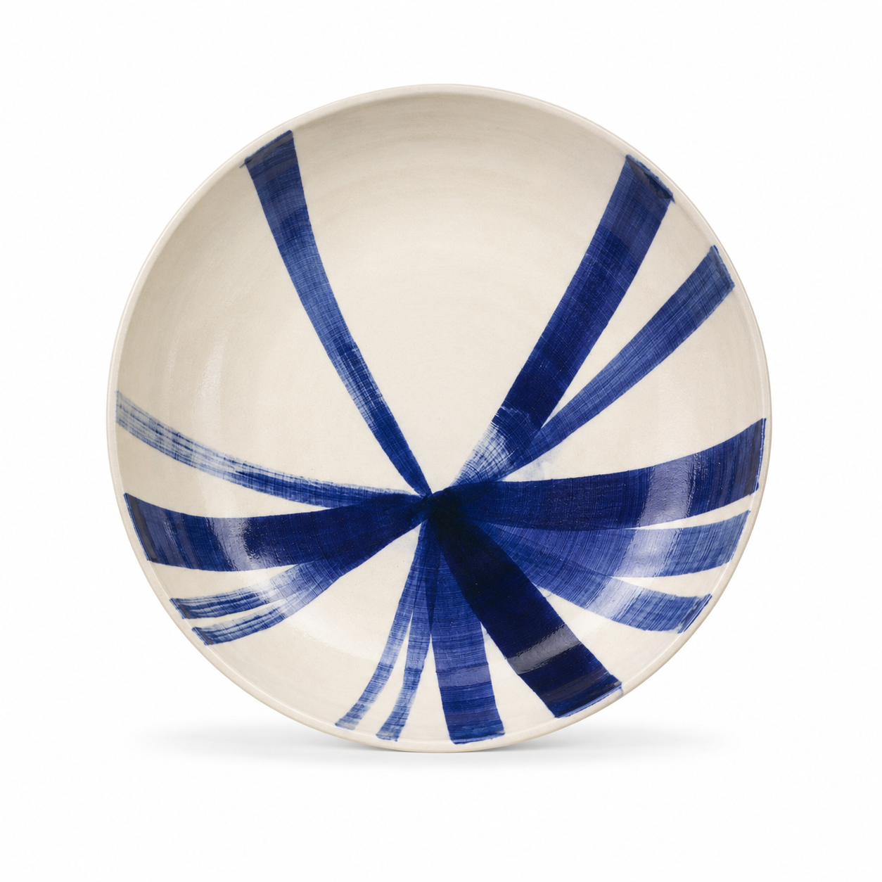 Bol en céramique à rayons bleus.png
