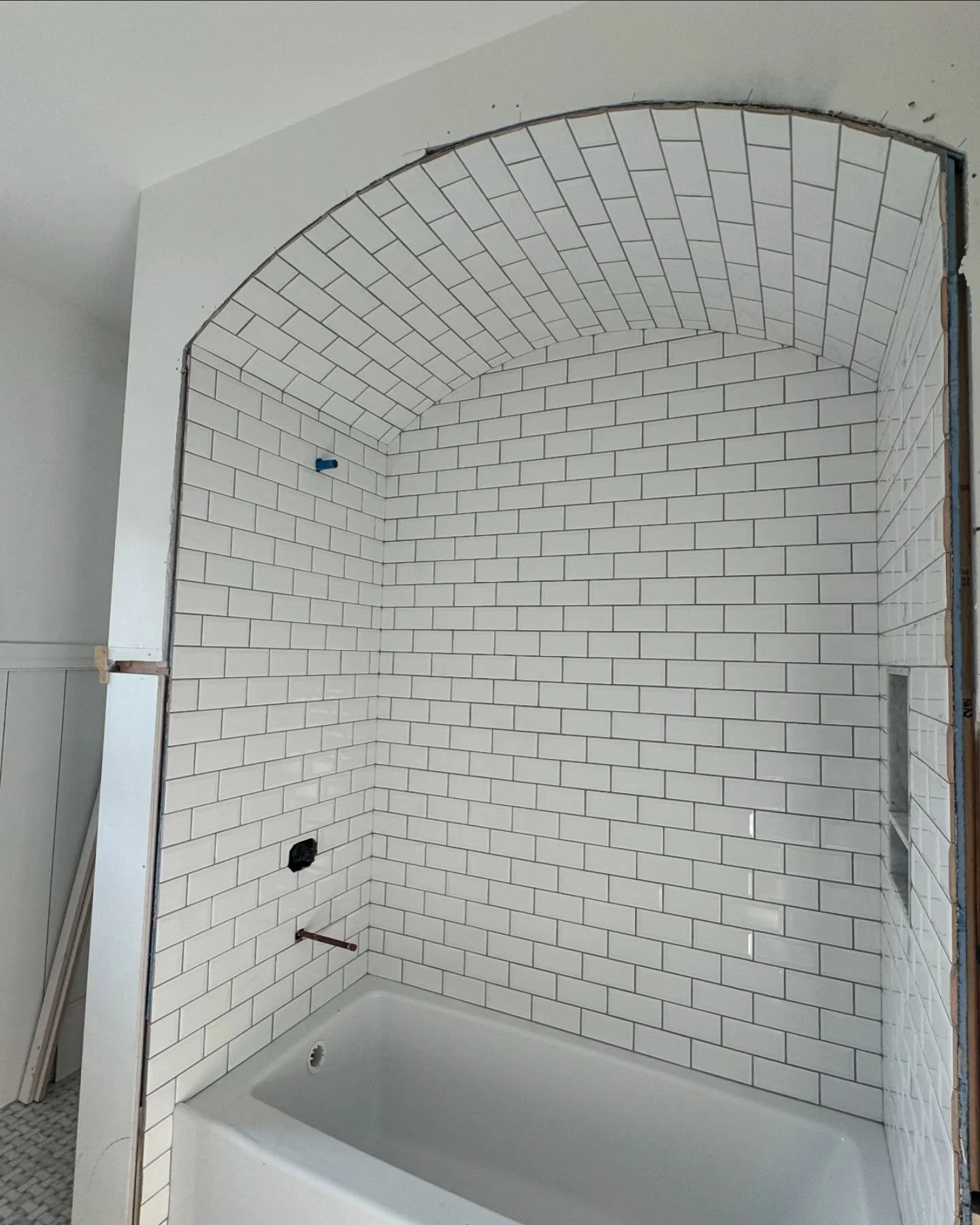 tub-curved-ceiling-subway-tile-1.jpg