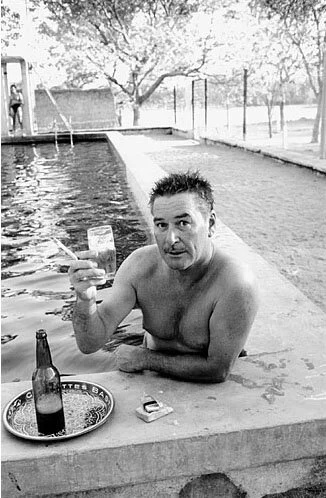 Errol Flynn at Garden of Allah pool.jpg