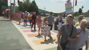 The town of Woodstock, NB shows its support for the LGBTQ community after someone defaced a rainbow painted crosswalk