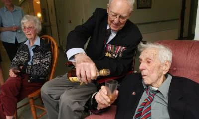 ( photo is of the late David M. Dickson and the late Nelson Adams, both of whom were part of the D-Day invasion forces .)
