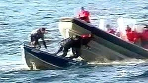 Burnt Church 2000. A federal fisheries patrol vessel rams a native fishing boat