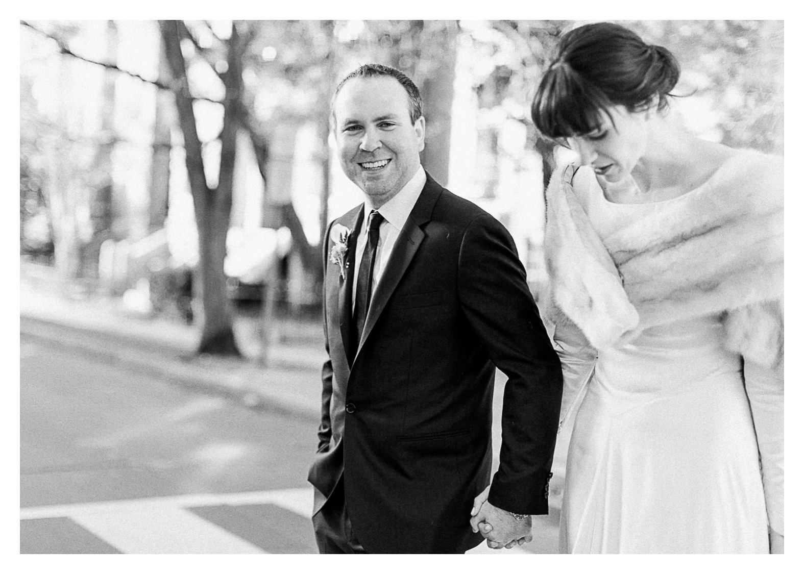 washington-dc-wedding-catholic-capitol-hill-bride-groom-portraits-walking-groom-smiling-candid.jpg
