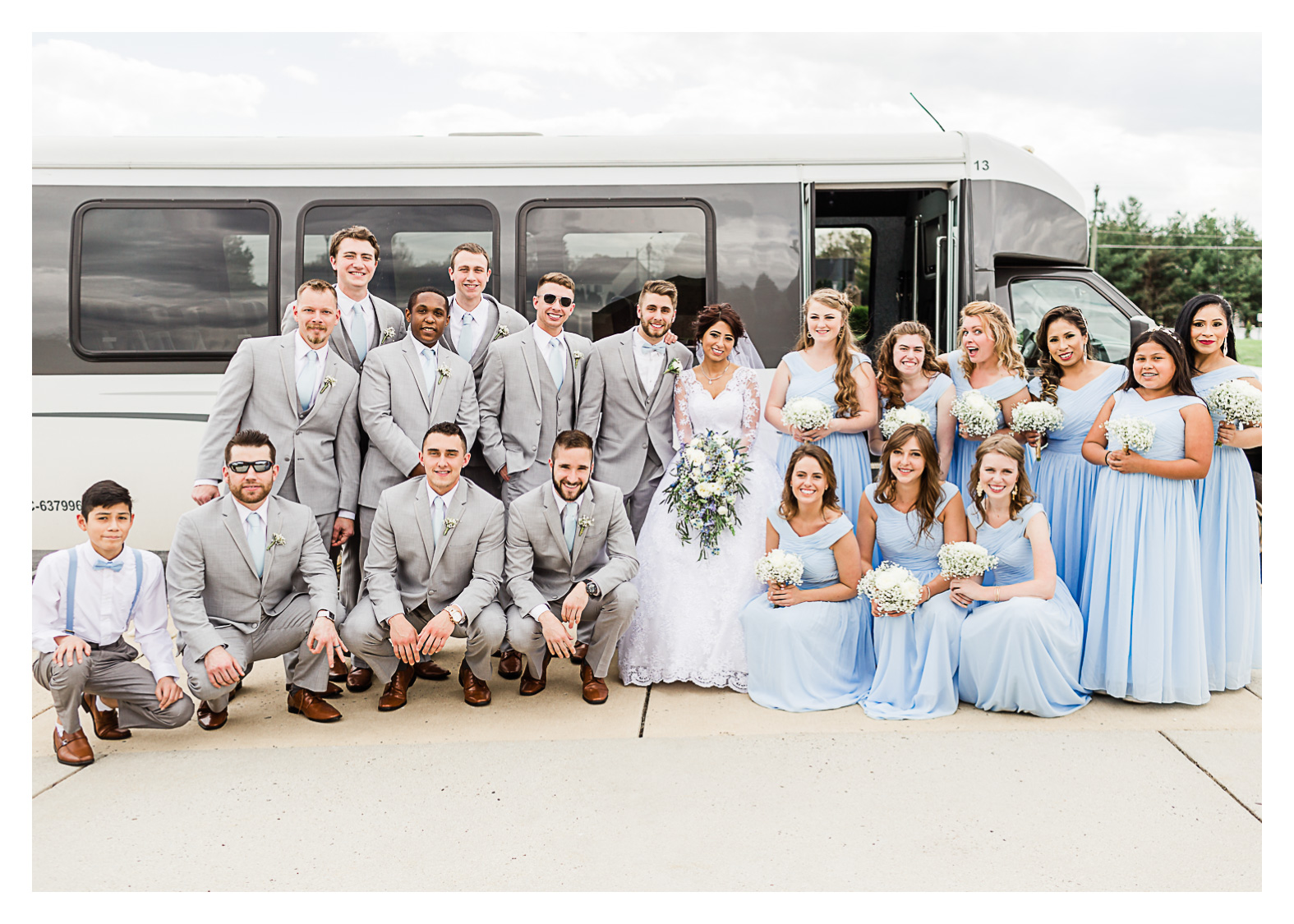 manassas-virginia-wedding-bridal-party-in-front-of-party-bus-blue-dresses.jpg