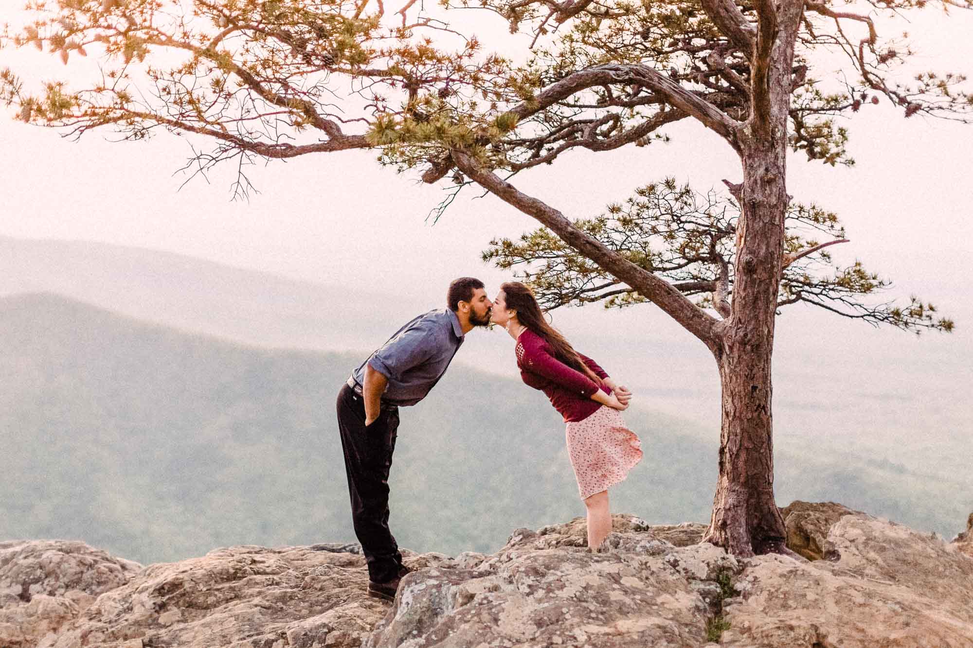 charlottesville-engagement-session-ravens-roost-overlook-outdoor-engagement-session-virginia-blue-ridge-silly-kissing.jpg