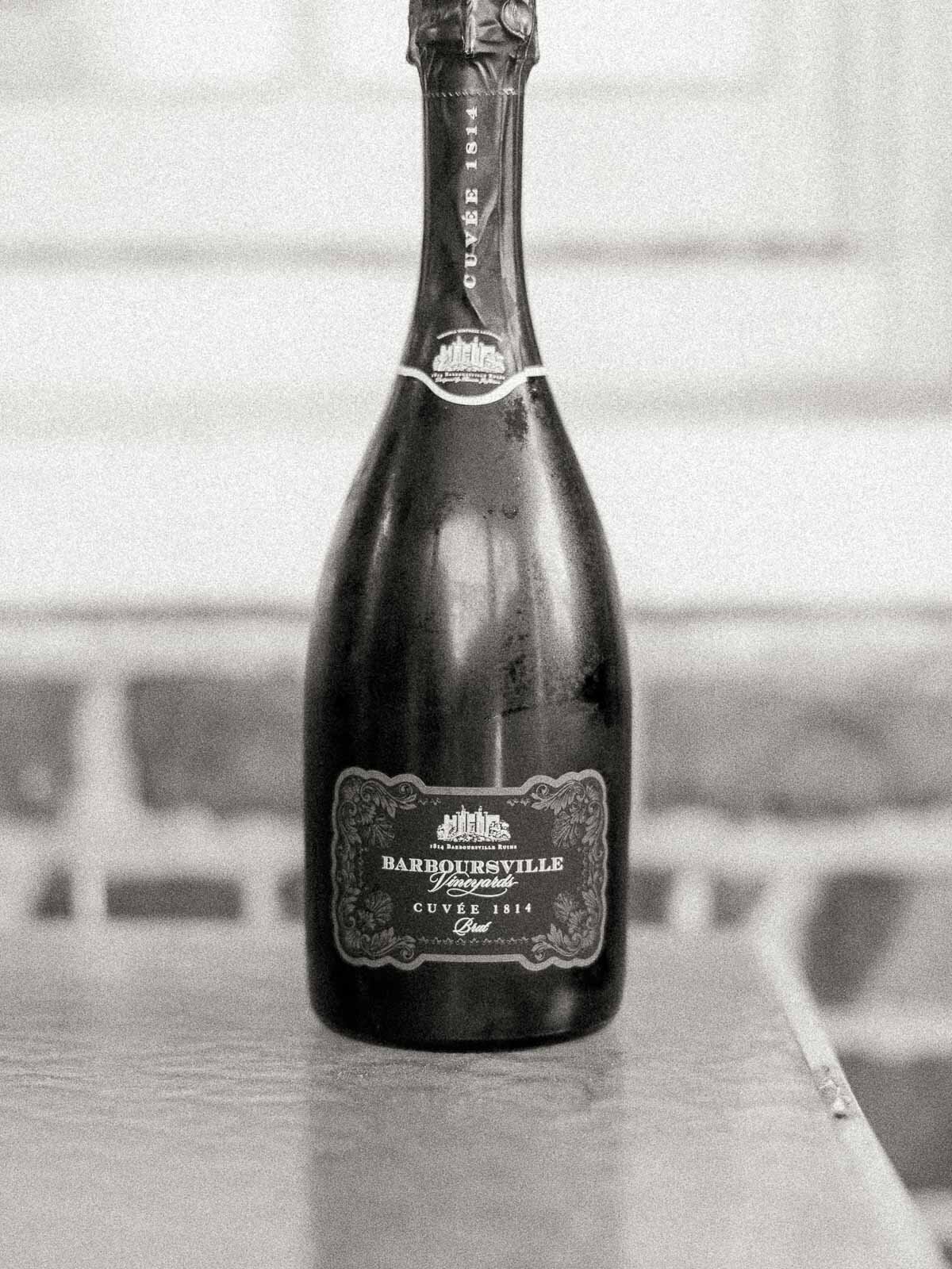 bottle-of-barboursville-vineyard-champagne-resting-on-table