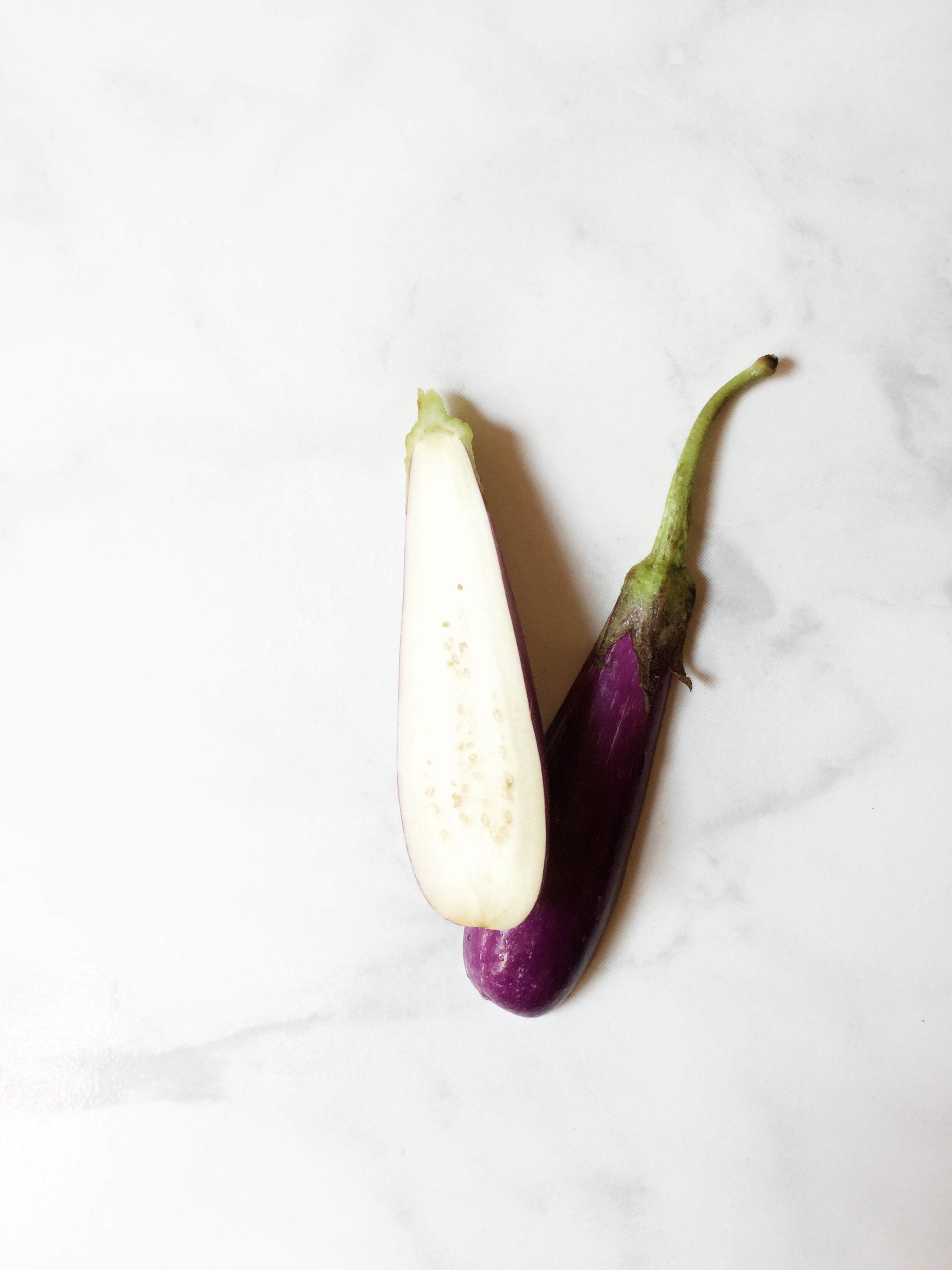 I’ve used fairy tale eggplants, but I recommend Italian or Japanese dark purple eggplants for Bengali begun’er tok.