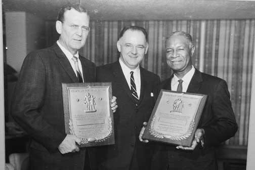 Historic photo of Gaither accepting yet another award for his amazing accomplishments. One of many photos housed at the Gaither House.