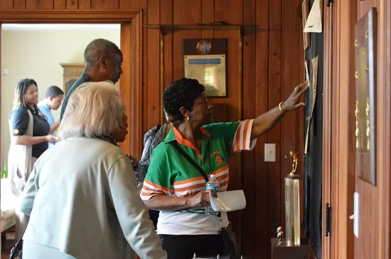 Guests view historic memorabilia inside the home of Coach Gaither.