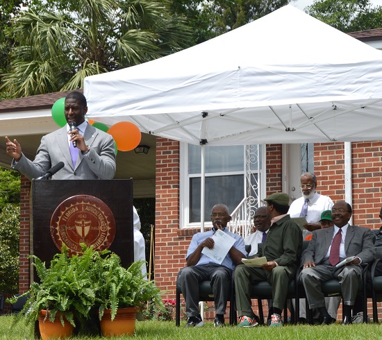 Tallahassee Mayor Andrew Gillum reads a proclamation from the city.
