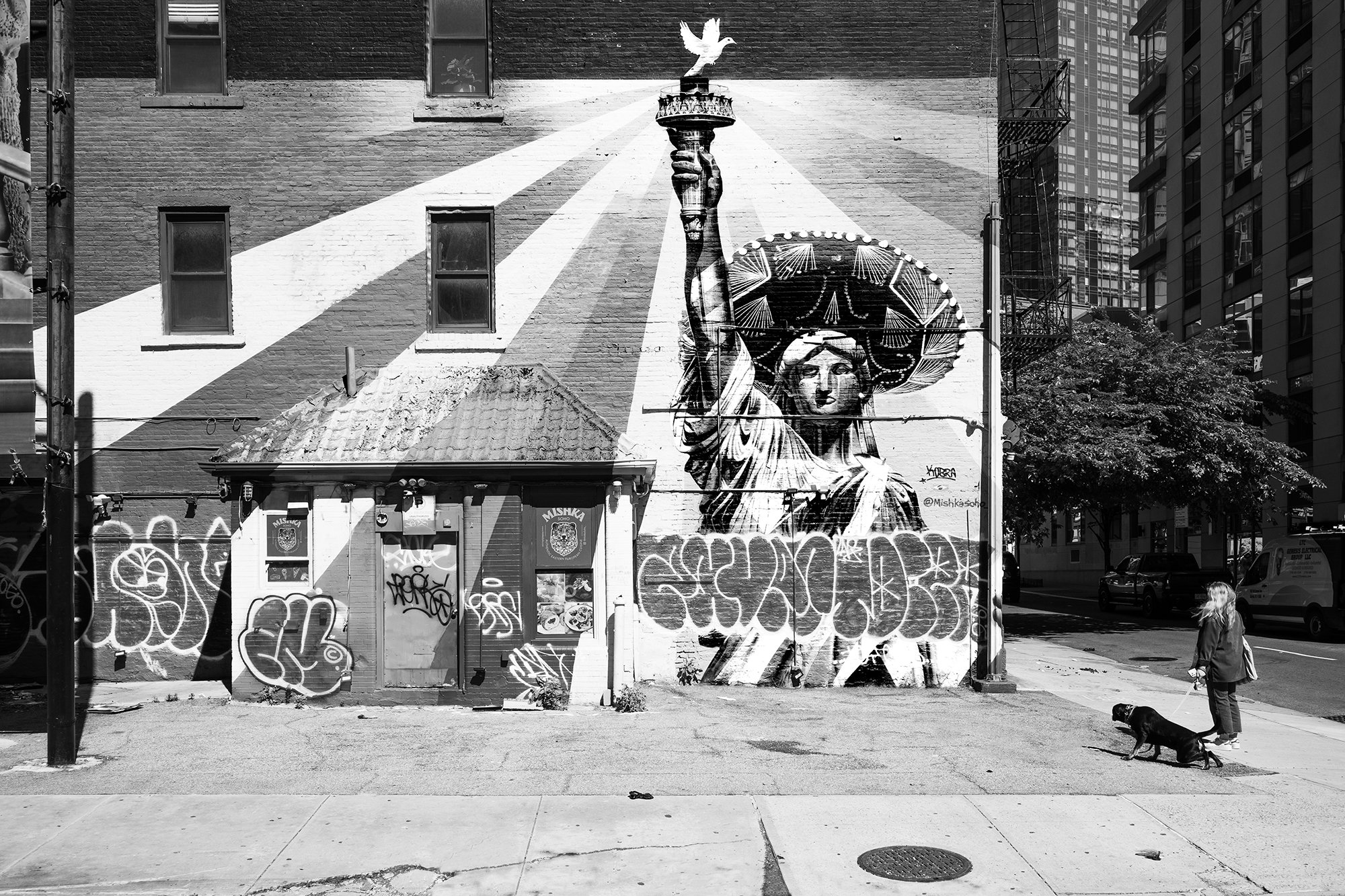 “Liberty” - a mural painted by street artist Eduardo Kobra in 2018 - lady liberty with sombrero and peace dove