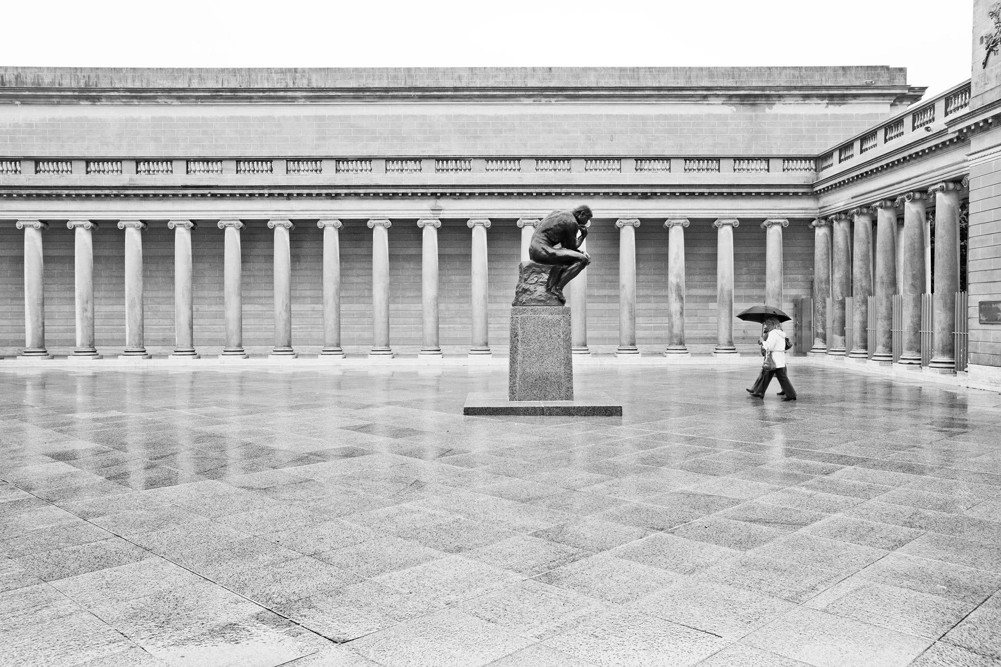 Couple with Umbrella and Statue, Legion of Honor Museum, San Francisco, California, USA