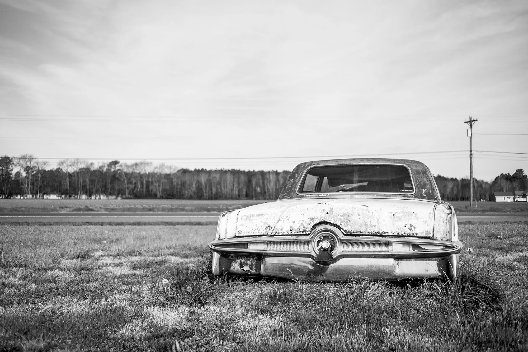 1964 Chrysler Imperial in a field in Scottsboro, Alabama, USA
