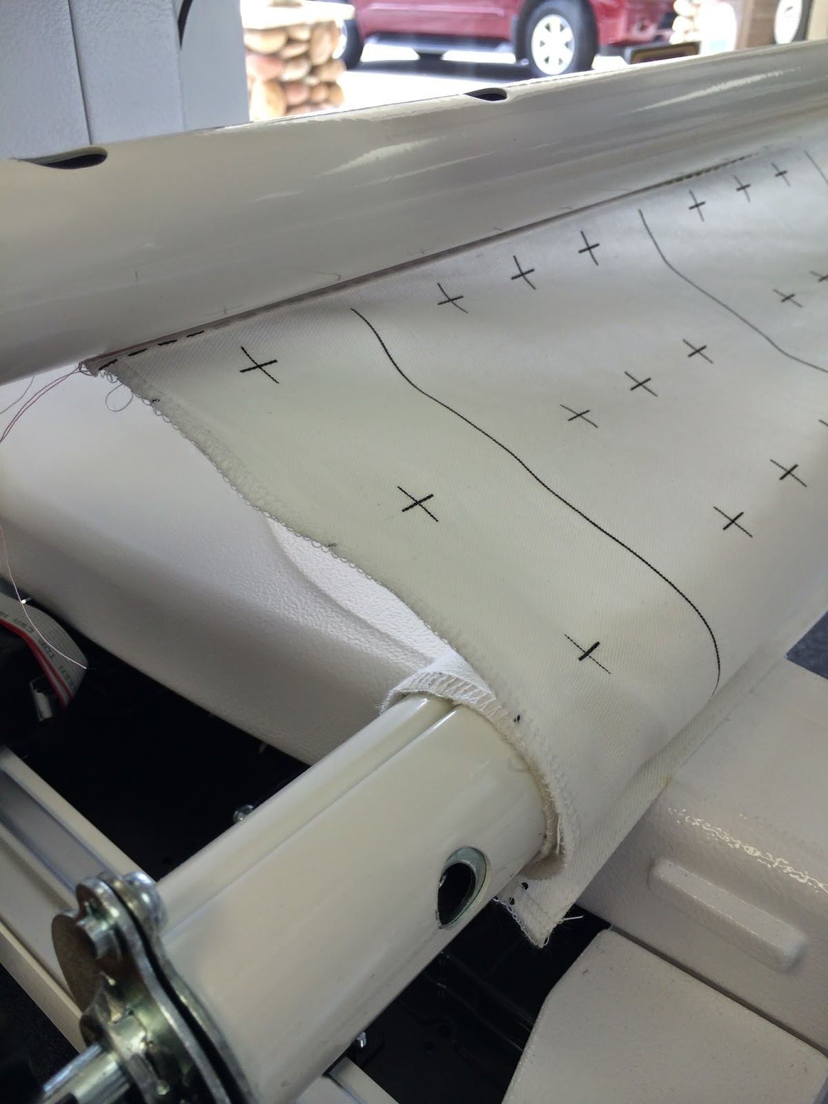 Dead rail is rolled 180 degree. This process is how the frame will keep tension on the quilt as you quilt.