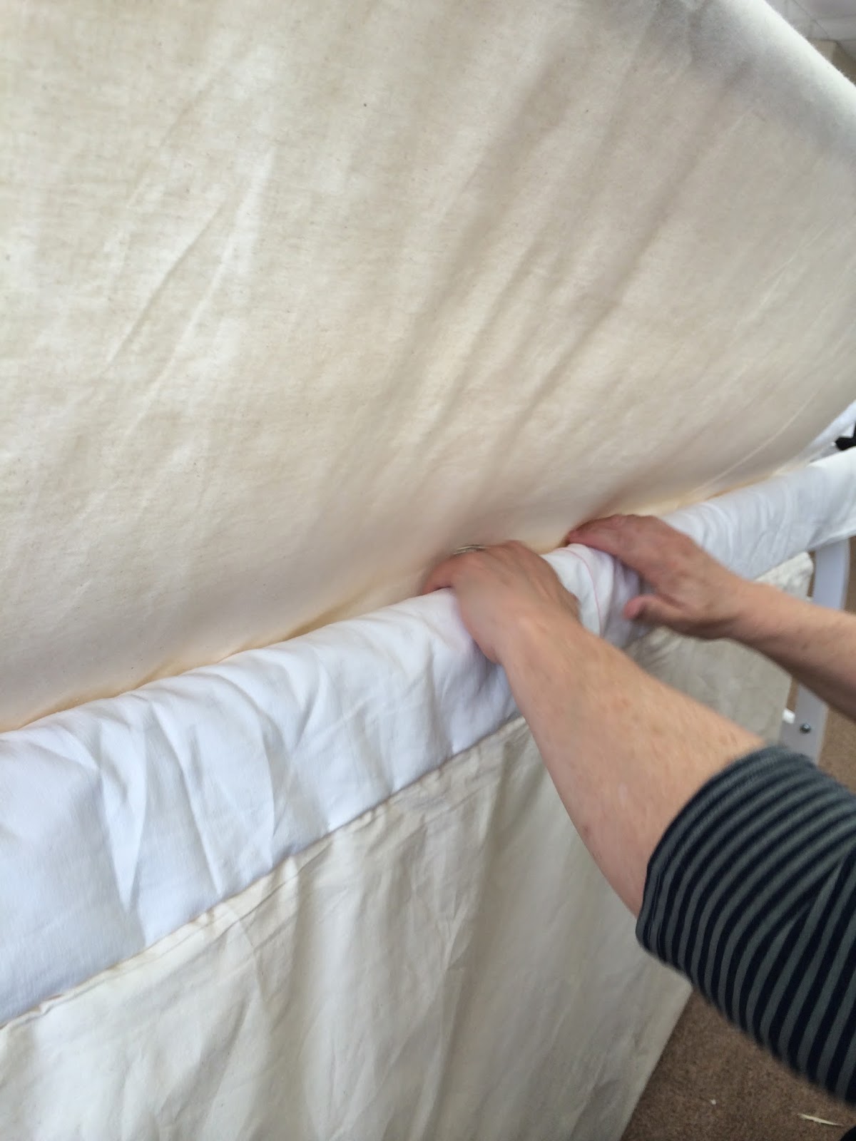 Baste the top of the quilt to the backing and batting. Repeat pinning to the leaders with the top of the quilt.