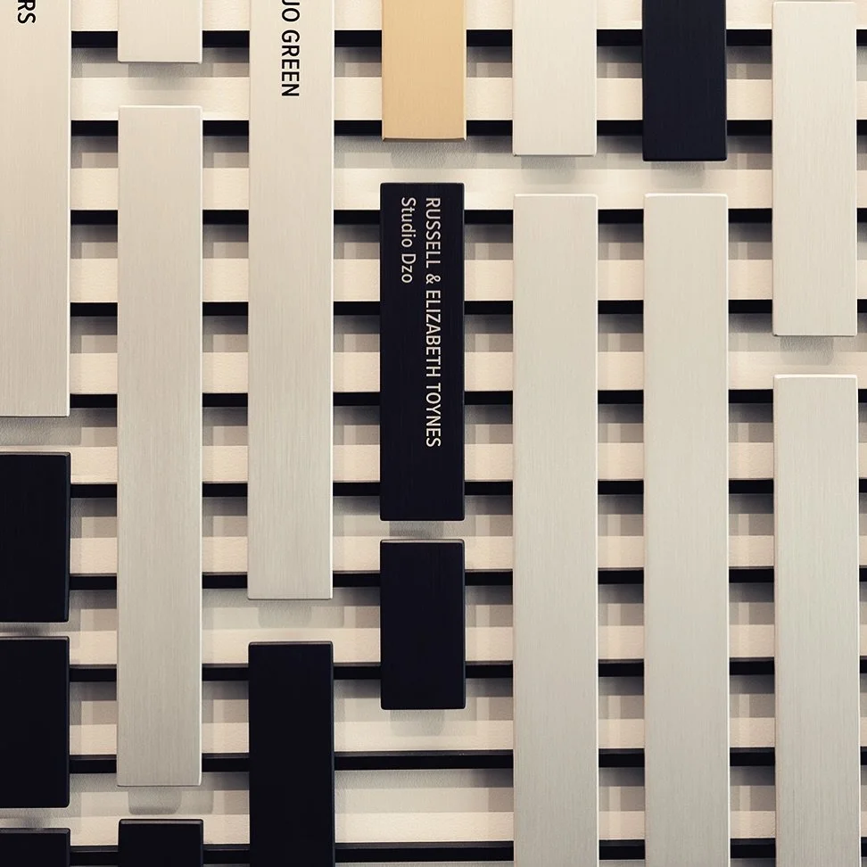 Immediately greeting guests as they enter the Austin Symphony Orchestra’s HQ is a stunning donor recognition wall inspired by the form and rhythm of orchestra bells. Featuring laser-engraved names on custom-cut anodized aluminum in gold, silver