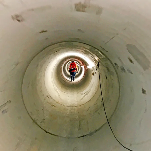 INSPECTION: Workers inspect the shaft at the end of the new stormwater shaft under Wellesley Street