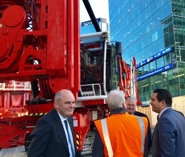 MASSIVE: The official party at the signing inspect the large CRL construction machinery outside Britomart