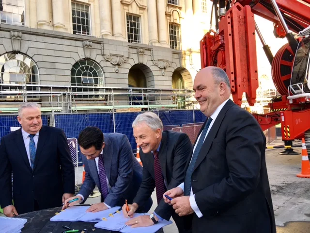 AGREEMENT: Signing the agreements Deputy Mayor Bill Cashmore, Transport Minister Simon Bridges, Mayor Phil Goff and Finance Minister Steven Joyce at the Britomart construction site