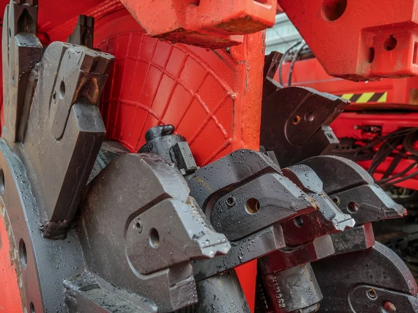 A close up of Sandrine. This bright red 90 tonne piling rig named Sandrine worked inside and outside the historic Chief Post Office (Britomart Transport Centre) building until being returned to France in early 2018. During Sandrine's work at the CPO, passers-by got used to seeing the huge 10m high distinctive silos in Lower Queen Street. These were part of the bentonite work.