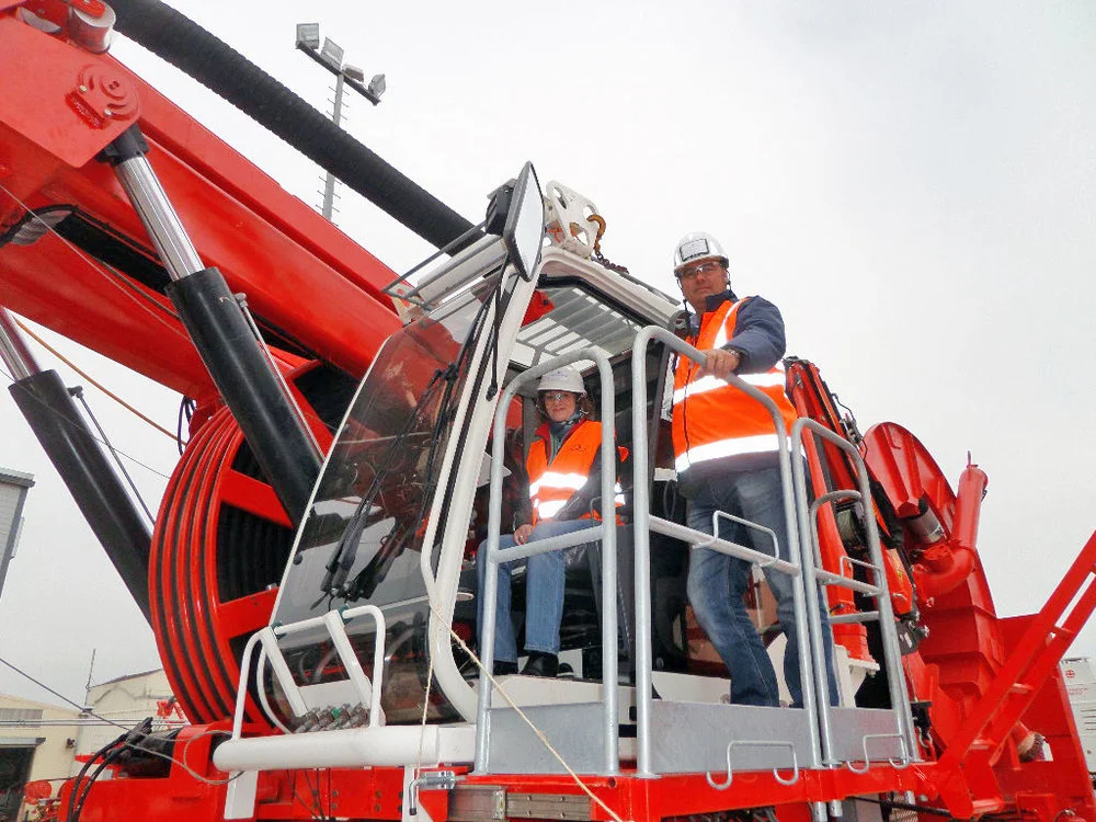 The real Sandrine pictured sitting inside the rig