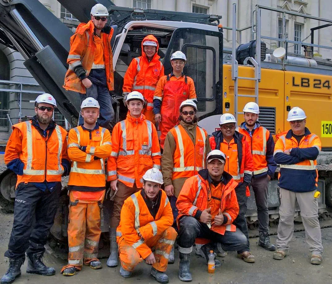 COMPLETED: The piling team after the 70th secant pile had been installed.