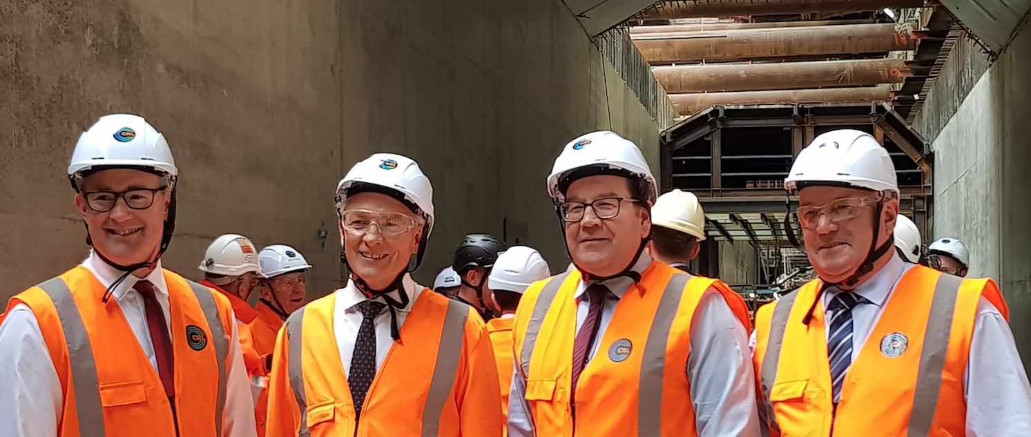 Minister of Transport, Hon. Phil Twyford, Mayor of Auckland Phil Goff, Finance Minister, Hon. Grant Robertson and Deputy Auckland Mayor, Bill Cashmore in the CRL Albert Street trench