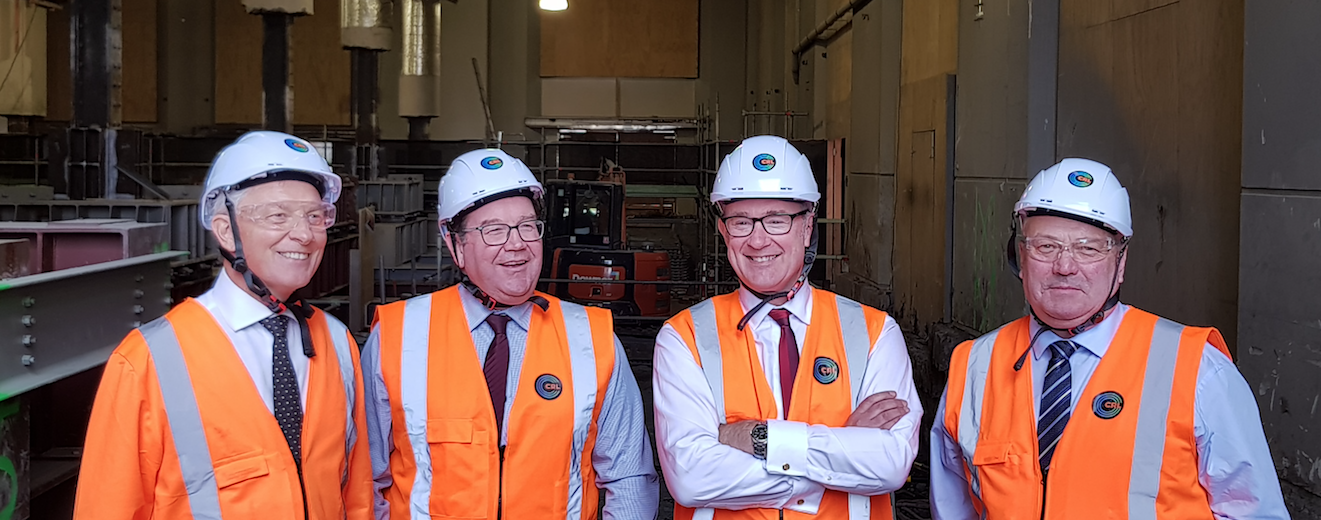 Mayor of Auckland Phil Goff, Minister of Finance Hon. Grant Robertson, Transport Minister Hon. Phil Twyford and Deputy Mayor Bill Cashmore inspect the CRL construction inside the Chief Post Office building