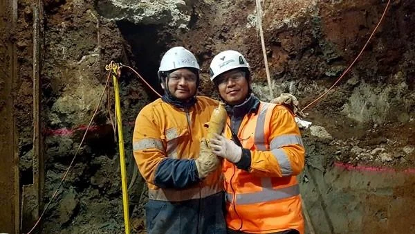 Downer NZ and Soletanche Bachy JV workers Raj and Noel. In September 2018, they uncovered a complete stoneware mineral water bottle from the 1880s. It was produced in the west German Duchy of Nassau, famous for its mineral springs. Ray and Noel found it in reclamation fill, about five metres under modern ground level.